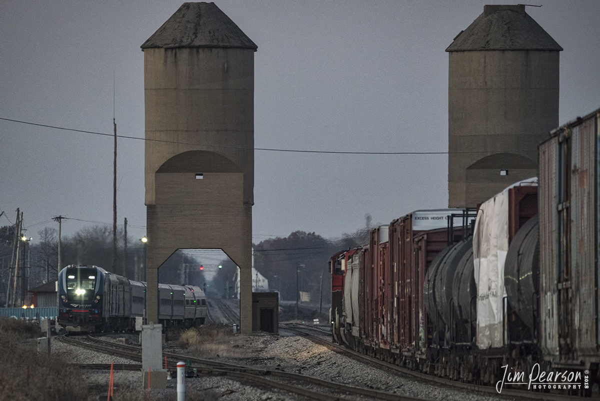 November 21, 2018 - Arriving just over 3 hours late due to mechanical problems in Chicago, Amtrak 391, the Saluki, meets a northbound CN freight at the coaling towers in Carbondale, Illinois as the last light of the day fades from the sky on the Centrailia Subdivision. - #jimstrainphotos #illinoisrailroads #trains #nikond800 #railroad #railroads #train #railways #railway #amtrak #passengertrains #cn #cnrailway