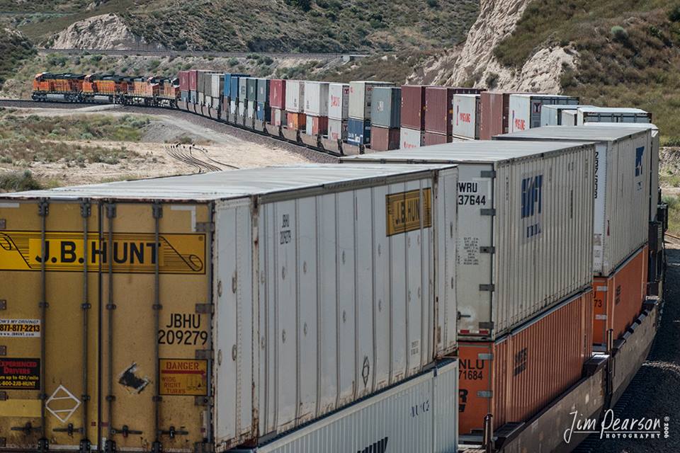 June 21, 2006 - A set of four units lead a BNSF Intermodal west down the Cajon Pass, on it's way toward Los Angles, CA.