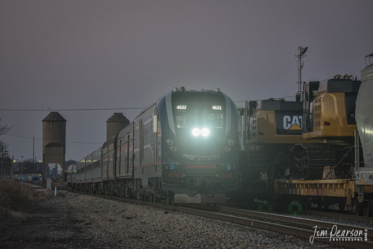November 21, 2018 - Arriving just over 3 hours late due to mechanical problems in Chicago, Amtrak 391, the Saluki, passes a northbound CN freight at the coaling towers in Carbondale, Illinois as the last light of the day fades from the sky on the Centrailia Subdivision. - #jimstrainphotos #illinoisrailroads #trains #nikond800 #railroad #railroads #train #railways #railway #amtrak #passengertrains #cn #cnrailway