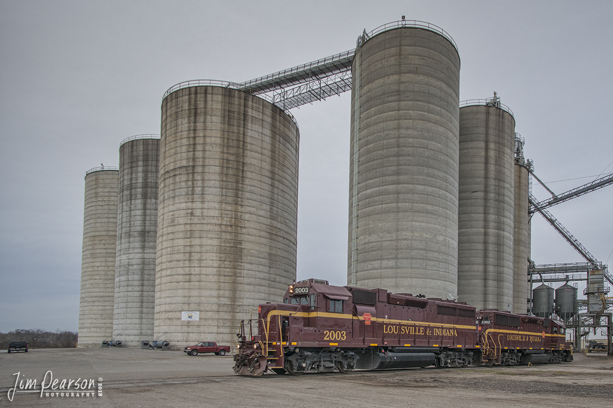November 23, 2018 - Louisville & Indiana Railroad 2003 and 2302 pull through the wye at the Kokomo Grain Co., Inc. in Edinburgh Township, IN, to run around its military train before backing their train into Camp Atterbury, Indiana. Camp Atterbury, located in south-central Indiana, about 4 miles west of Edinburgh, Indiana, serves as a military and civilian training base under the auspices of the Indiana National Guard. - #jimstrainphotos #indianarailroads #trains #nikond800 #railroad #railroads #train #railways #railway #LIRC #louisvilleandindianarailroad #militarytrain