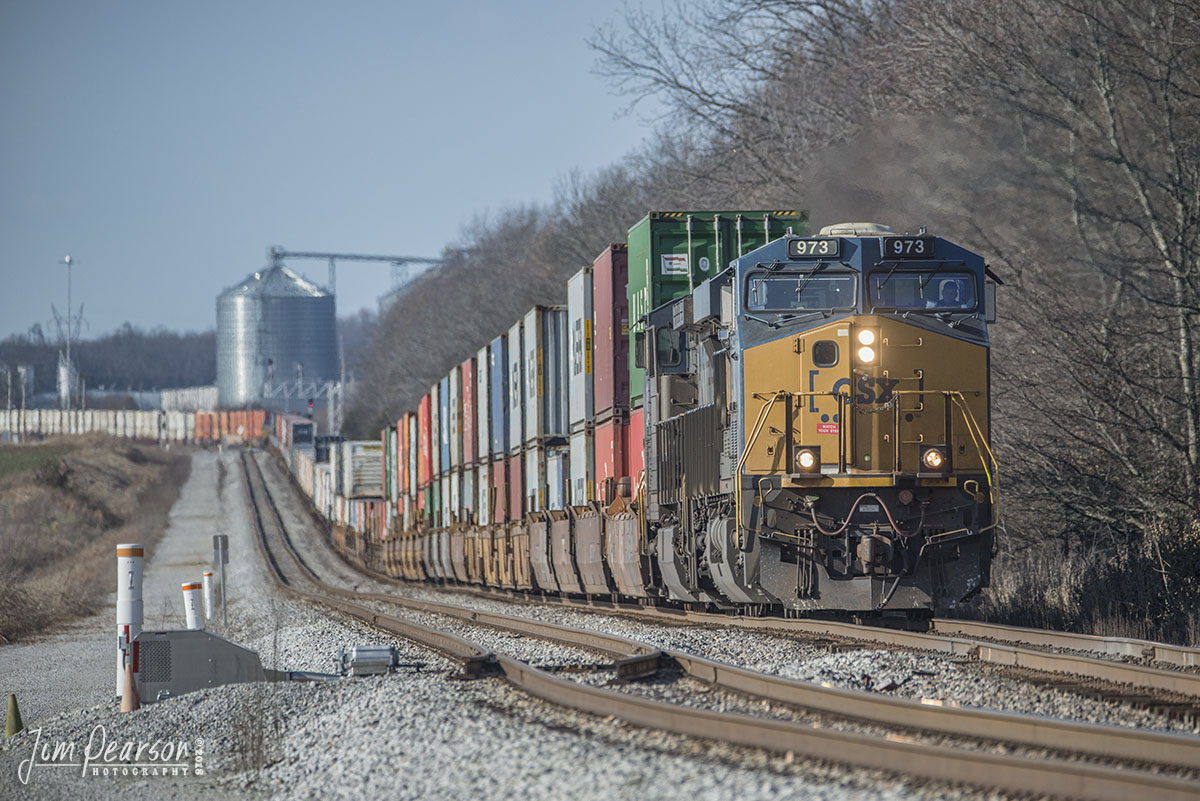 December 12, 2018 - CSX hot intermodal, Q025-11 (Bedford Park, IL - Jacksonville, FL), carrying a lot of Christmas Presents and other cargo, makes its way upgrade toward the south end of Pembroke, after completing a crew change at Casky Yard in Hopkinsville, Ky. - #jimstrainphotos #kentuckyrailroads #trains #nikond800 #railroad #railroads #train #railways #railway #csx #csxrailroad