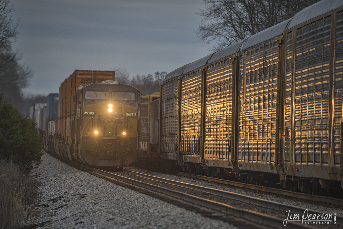 December 12, 2018 - Northbound CSX intermodal Q026 passes a southbound mixed freight at the north end of Cedar Hill, Tennessee at dusk on the Henderson Subdivision. - #jimstrainphotos #kentuckyrailroads #trains #nikond800 #railroad #railroads #train #railways #railway #csx #csxrailroad