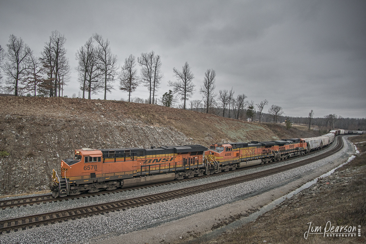 December 21, 2013 - CSX Q647 pulls through the curve on track 1 at Nortonvillle, Ky, with 3 different paint schemes, BNSF 6578 Gevo in H3 paint, BNSF 4886 Dash 9 in H2 paint and BNSF 1073 dash 9 in H1 paint, as it heads south on the Henderson Subdivision. - #jimstrainphotos #kentuckyrailroads #trains #nikond800 #railroad #railroads #train #railways #railway #csx #csxrailroad