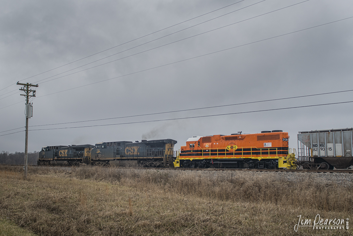 January 1, 2019 - CSX Q513-01, with a brand new Genesee & Wyoming motor third out, going to the Georgia Central Railway heads through the siding at Alliance as it heads south at Princeton, Indiana on the CE&D Subdivision. 

According to Wikipedia: The Georgia Central Railway (reporting mark GC) operates about 174 miles (280 km) of former Seaboard Coast Line track from Macon, Georgia through Dublin, Georgia and Vidalia, Georgia to Savannah, Georgia. It also operates about 20 miles (32 km) of trackage between Savannah and Riceboro, Georgia, switching Interstate Paper LLC. It connects with CSX Transportation and the Norfolk Southern Railway. The Georgia Central Railway is owned by Rail Link, a subsidiary of Genesee & Wyoming Inc. - #jimstrainphotos #indianarailroads #trains #nikond800 #railroad #railroads #train #railways #railway #csx #csxrailroad