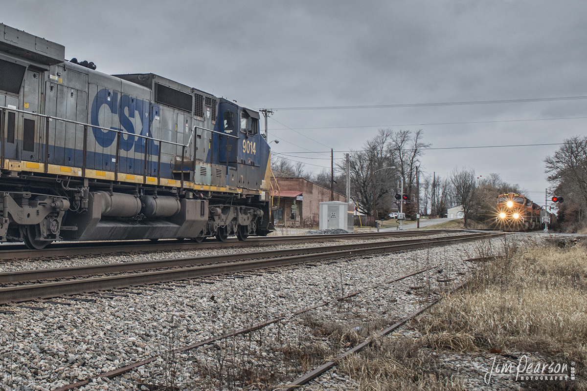 December 21, 2013 - CSX Q647, with 3 different paint schemes, BNSF 6578 ES44C4 in H3 paint, BNSF 4886 Dash 9 in H2 paint and BNSF 1073 dash 9 in H1 paint, meets a northbound mixed freight at Robards, Ky as it south on the Henderson Subdivision. - #jimstrainphotos #kentuckyrailroads #trains #nikond800 #railroad #railroads #train #railways #railway #csx #csxrailroad