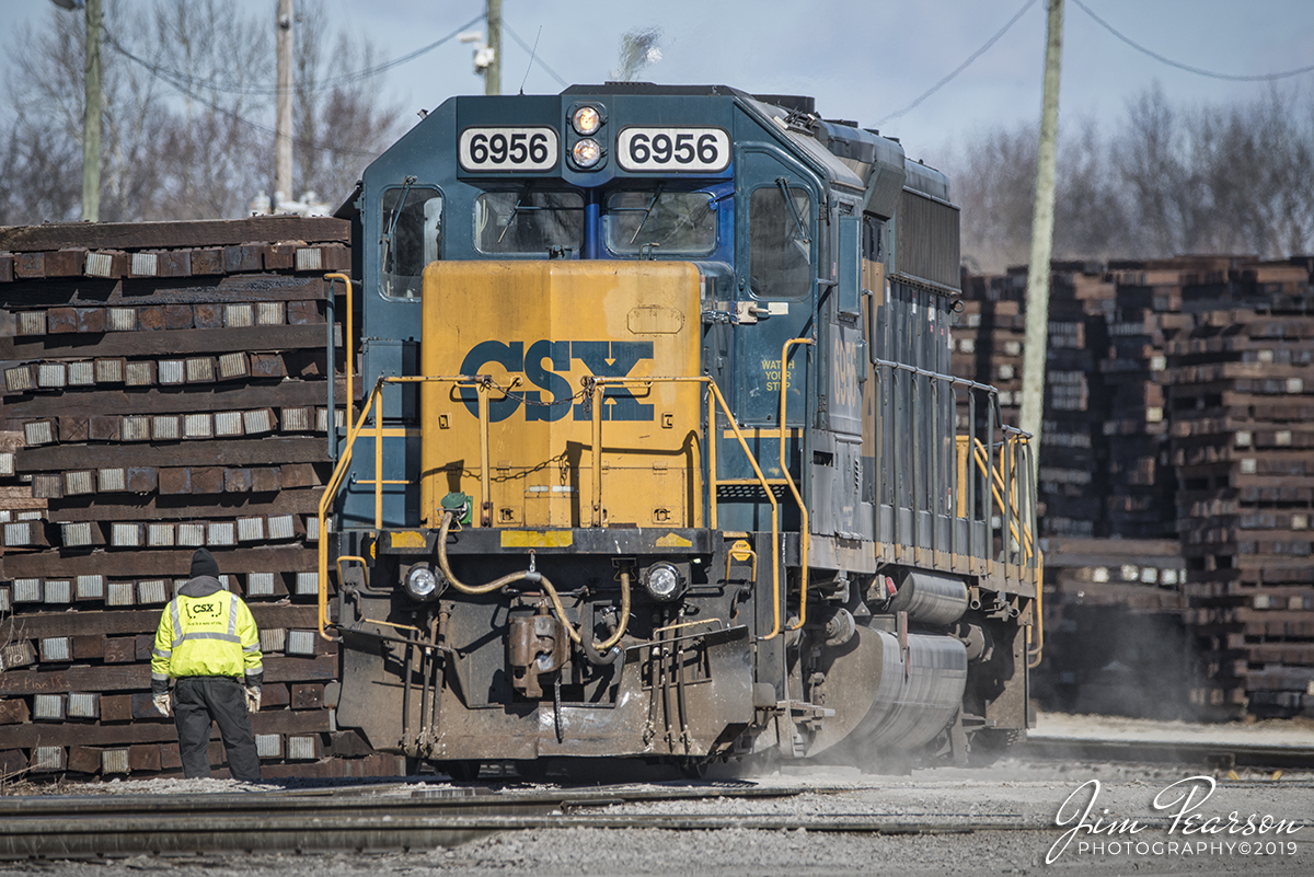 January 30, 2019 - The conductor keeps a watchful eye as CSXT 6956 heads up the yard power at Guthrie, Ky as it works in the Koppers Plant that runs alongside the Henderson Subdivision. According to Koppers website, "the Koppers Guthrie plant was constructed by the L&N Railroad in 1912 at the intersection of its main line north and south/east and west. The plant was purchased by Koppers in 1958. Today, Guthrie is a primary supplier of crossties, switch ties and track panels to the CSX and national railroad systems." - #jimstrainphotos #kentuckyrailroads #trains #nikond800 #railroad #railroads #train #railways #railway #csx #csxrailroad