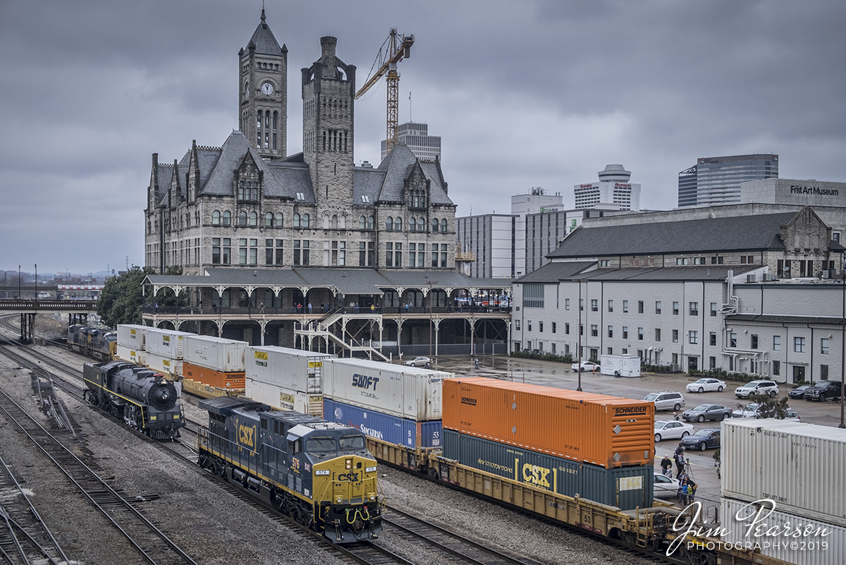 March 9, 2019 - CSX Q028 head north as it passes NC&SL Steam Locomotive and CSX 576 NC&SL Sticker unit as they set on display next to Union Station in downtown Nashville, TN. The locomotive was then towed on its own wheels to the restoration facility at the Tennessee Central Railway Museum, where it will undergo and estimated two years of restoration. Visit http://www.nashvillesteam.org/ to find out more information and how you can help support this endeavor. - #jimstrainphotos #kentuckyrailroads #trains #nikond800 #railroad #railroads #train #railways #railway #csx #csxrailroad #NCSL576 #steamlocomotive