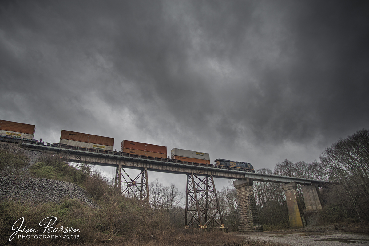 March 9, 2019 - CSX Q026, with CSXT 824 leading, heads north across Sulfur Fork Creek Trestle at Springfield, Tennessee, on the Henderson Subdivision, under stormy skies. - #jimstrainphotos #kentuckyrailroads #trains #nikond800 #railroad #railroads #train #railways #railway #csx #csxrailroad