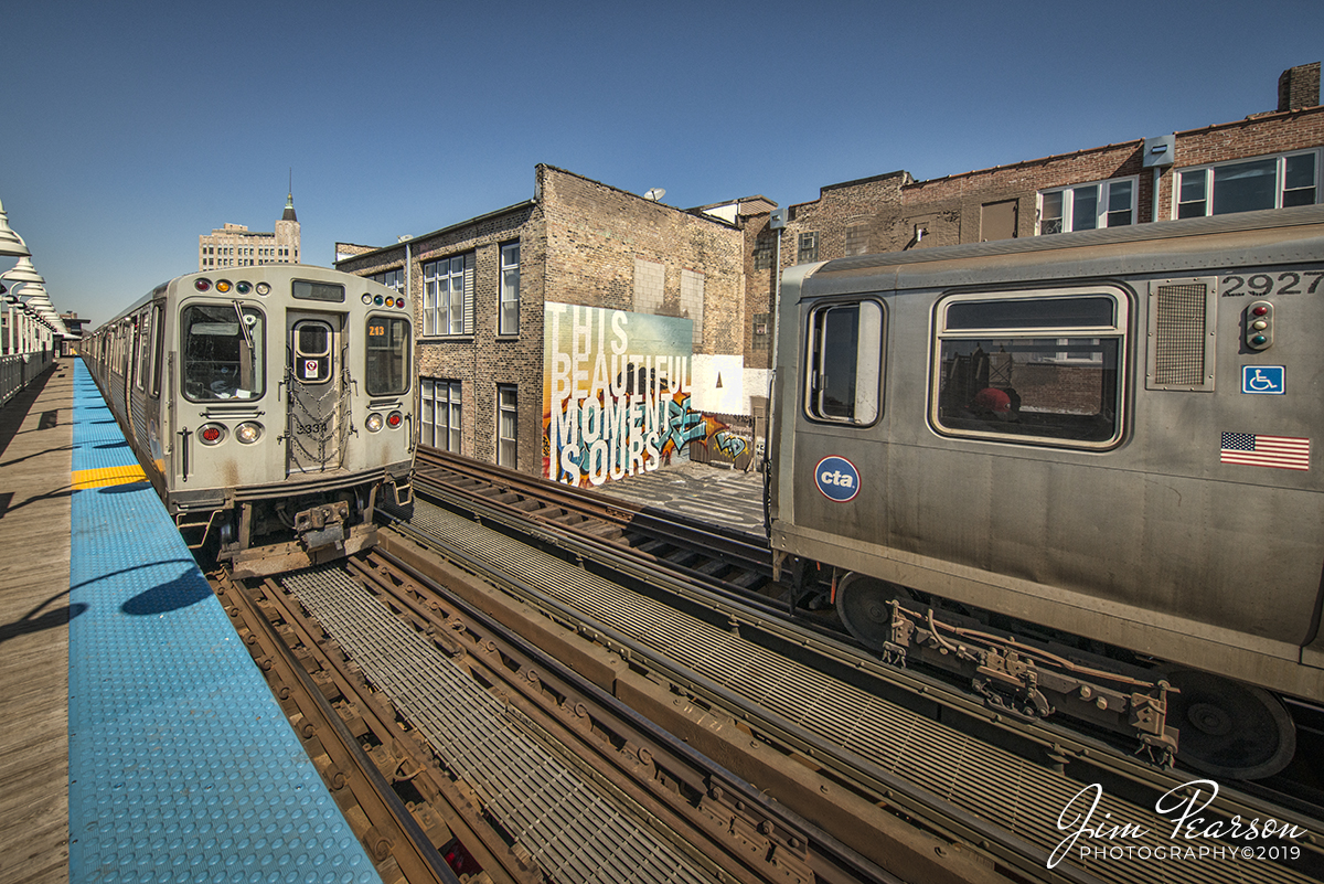 March 23, 2019 - "This Beautiful Moment is Ours" - CTA 213 toward Forest Park meets an O'Hare bound train  at the east end of the station platform at Damien Station at Chicago, Illinois. - #jimstrainphotos #illinoisrailroads #trains #nikond800 #railroad #railroads #train #railways #railway #cta #thechicagol #chicago #11mmirixlens