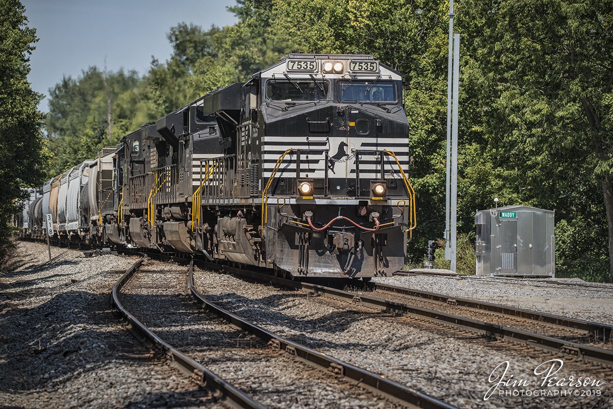 August 10, 2019 - Norfolk Southern 7335 leads NS 273 as it passes through the west end of Waddy, Ky on its way east on the Louisville District.