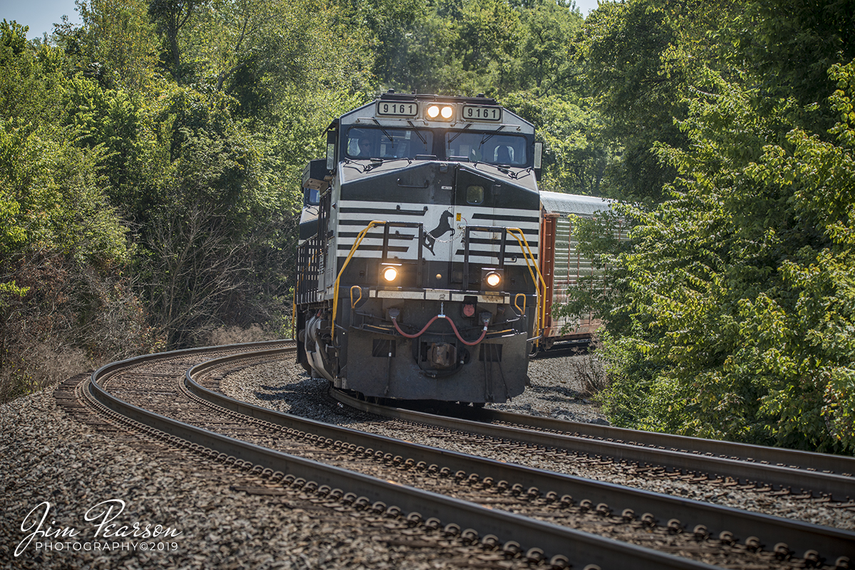 August 10, 2019 - Norfolk Southern 9161 leads a empty autorack as it pulls out of the siding at the west end of Waddy, Ky as it heads west on the Louisville District.
