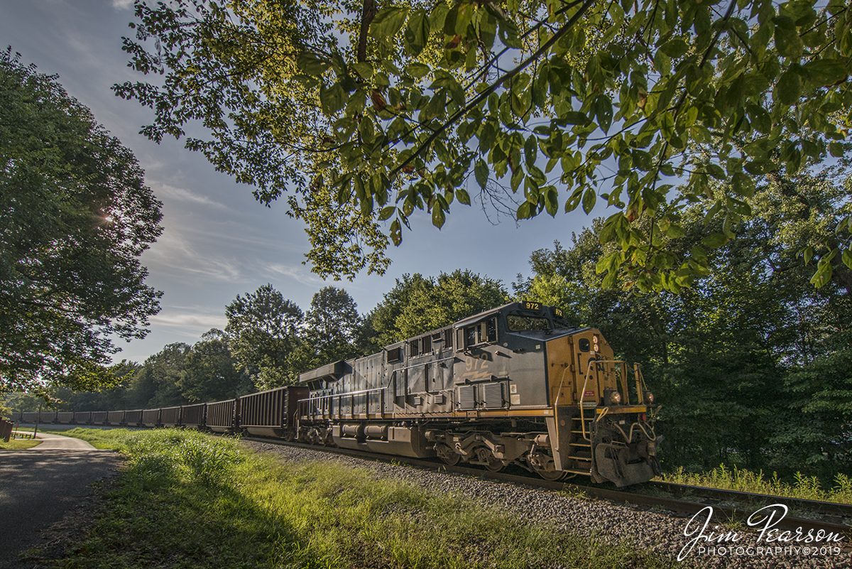 August 17, 2019 - CSXT 972 leads a load of 75 coal cars on J800-16 as they round the curve coming out of Providence, Ky on the Morganfield Branch. This one of the last trains to pickup a load of coal from Dotki Mine in Clay, Ky since it ceased operations on August 14th, 2019. 

The mine has been in operation since 1969 and I'm told that about 2-3 more trains will pickup there with supposedly the last train out of the mine on Thursday, 22nd of August, 2019. Any remaining coal will leave by truck. I expect, though I've not been told, that the trains that used to get coal from Dotki, will now get it from Warrior Coal in Nebo, Ky, which means increased traffic on the Paducah and Louisville line perhaps. We shall see...