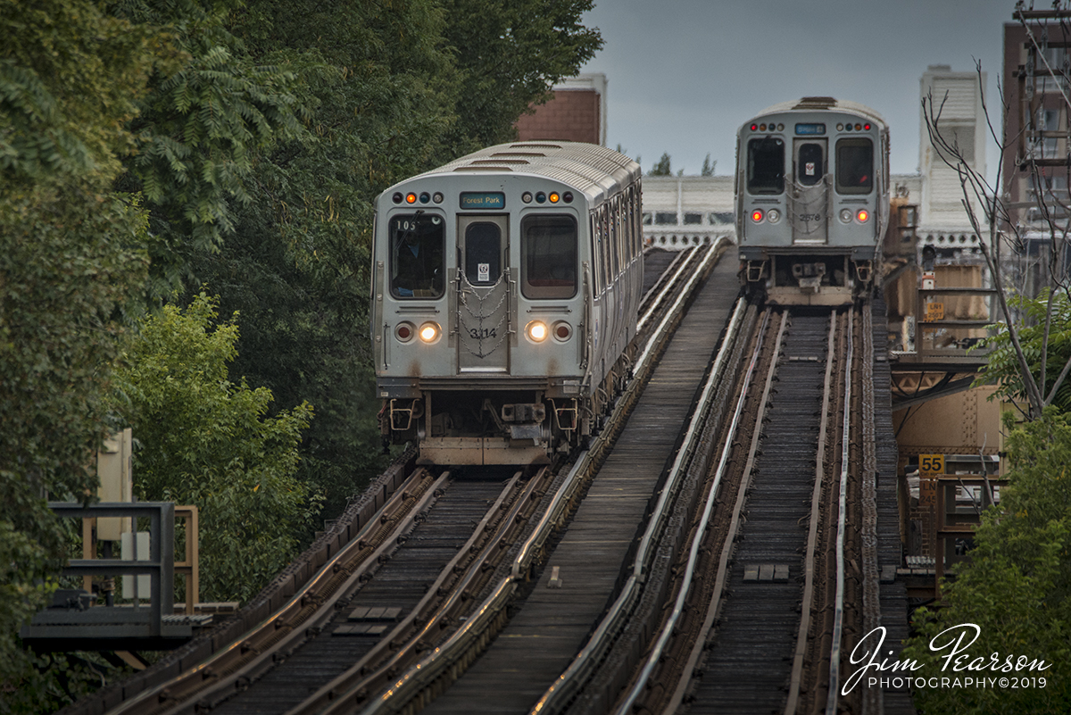 September 8, 2019 - CTA Blue Line train 105 heads downhill as it approaches the Damen Station, bound for Forest Park, after passing a O'Hare bound train in Chicago, Illinois.