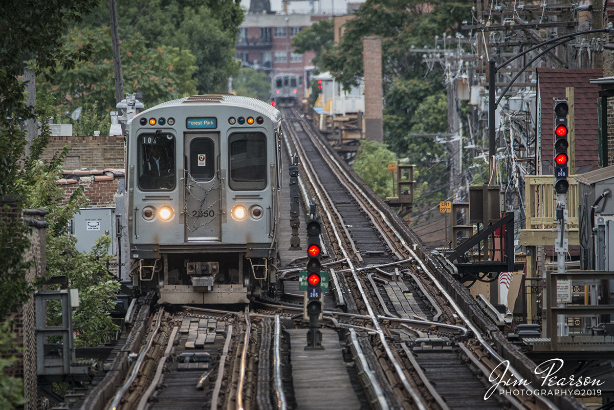 September 8, 2019 - CTA Blue Line train 105 to Forest Park passes a crossover as it approaches the Damen Station as it heads toward downtown Chicago, Illinois.