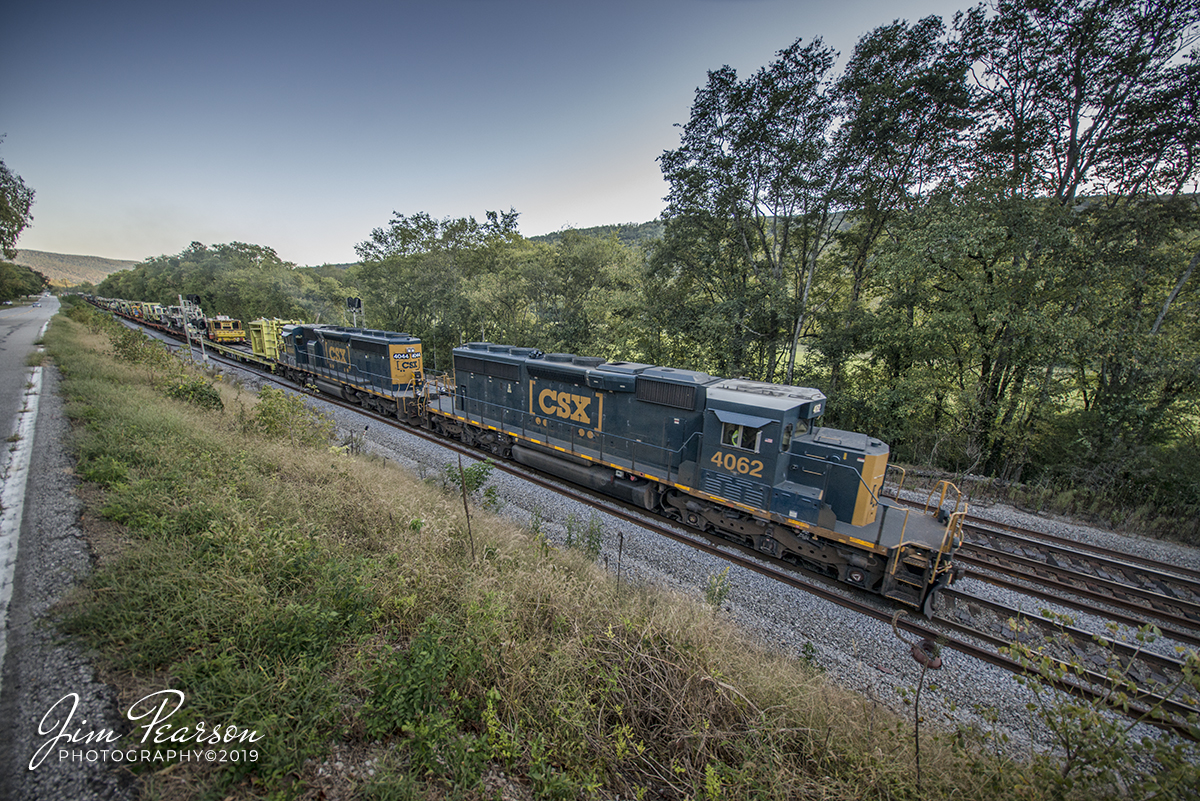 September 22, 2019 - CSX W032-17, with CSXT 4062 a SD40-3 leading, heads north at Sherwood, Tennessee on the Chattanooga Subdivision with a load of MOW equipment.