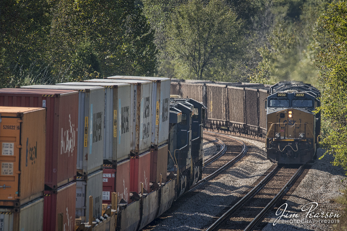 October 8, 2019 - A northbound empty coal train CSX E319 meets southbound hot intermodal CSX Q025 at Nortonville, Kentucky as they both make their way along the Henderson Subdivision.