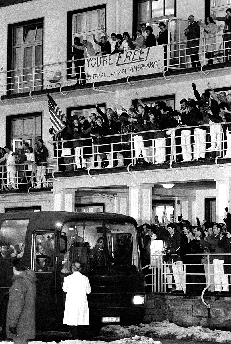 The 52 former hostages are welcomed and cheered by hospital personnel as they arrive at the base after their release from Iran.  The hostages will stay at the hospital for a few days before their departure to the United States.