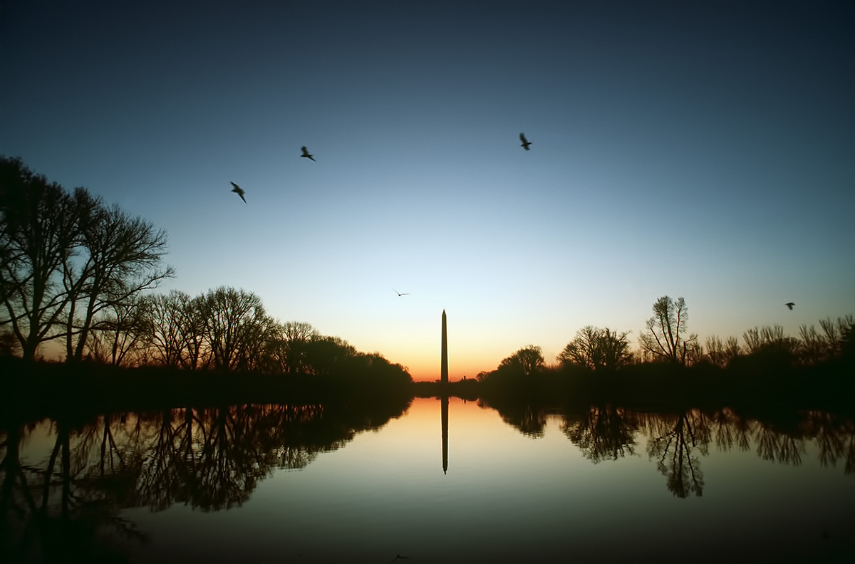 Blast From The Past - April 1, 1986 - The reflecting pool on the Mall reflects the Washington Memorial at sunset in Washington D.C. - USAF Photo by TSgt. James R. Pearson