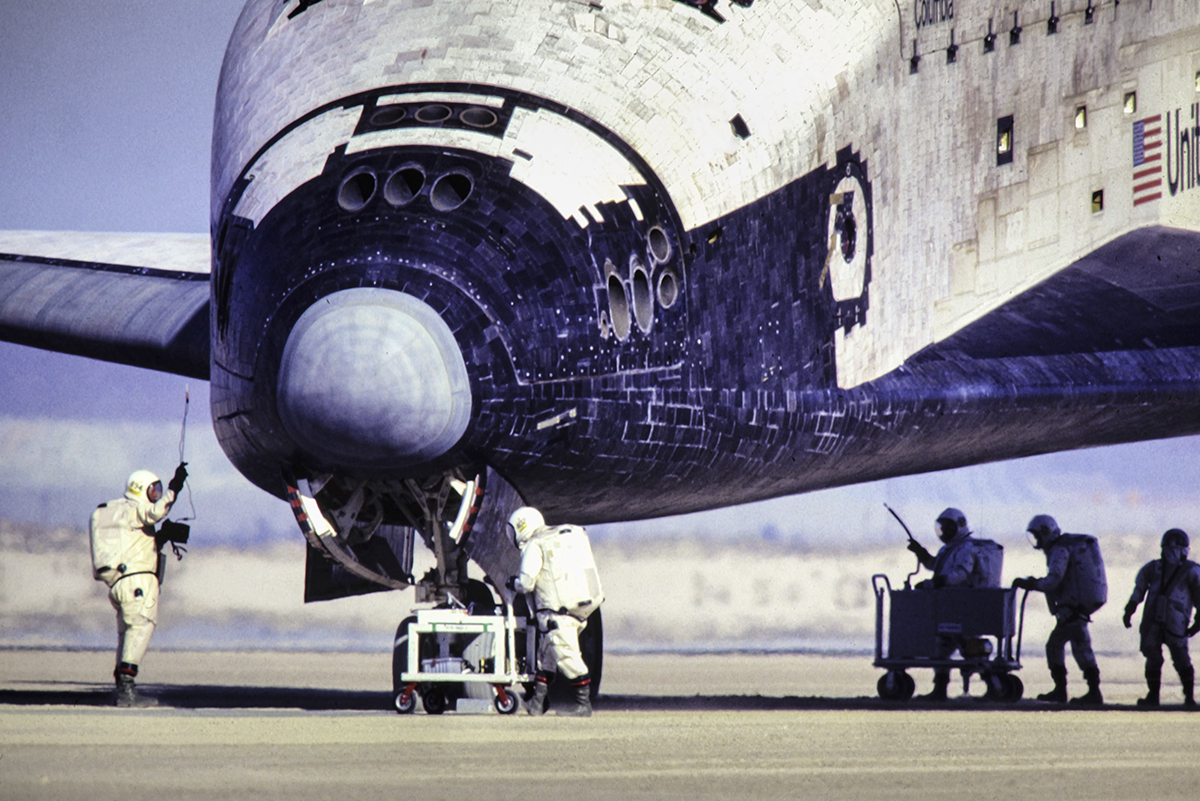 Blast From The Past - November 14, 1981 - Ground crews inspect and check the exterior of the Space Shuttle Columbia (STS-2) after it touched down on runway 23 at Edwards Air Force Base, California.

This was the second time the Columbia used the Edwards AFB landing site and I was so excited that I was one of the Air Force Photojournalists assigned to cover the landing! I had always dreamed of going into space, ever since I joined the Air Force in 1971, and this is as close as I would ever come to that dream. Still, it was a thrill to say the least.

According to the NASA Archives, The STS-2 Crew was Commander Joe H. Engle, Pilot Richard H. Truly and back up crew members, Thomas K. Mattingly II and Henry W. Hartsfield, Jr. 

The Mission Objectives were to demonstrate safe re-launch and safe return of the orbiter and crew. Verify the combined performance of the entire shuttle vehicle - orbiter, solid rocket boosters and external tank.

Payloads included the Orbital Flight Test Pallet consisting of the Measurement of Air Pollution from Satellite experiment, the Shuttle Multispectral Infrared Radiometer experiment, the Shuttle Imaging Radar experiment, the Features Identification and Location Experiment and the Ocean Color Experiment. Also included was the 11,048 lb. Development Flight Instrumentation pallet, the Aerodynamic Coefficient Identification Package, the Induced Environment Contamination Monitor and the 5,395 lb. Office of Space and Terrestrial Applications Pallet.

Mission Highlights: Launch originally set for Oct. 9 was rescheduled when a nitrogen tetroxide spill occurred during loading of the forward reaction control system. The launch scheduled for Nov. 4 delayed and then scrubbed when the countdown computer called for hold in the count due to an apparent low reading on fuel cell oxygen tank pressures. During the hold, high oil pressures were discovered in two of three auxiliary power units (APUs) that operate hydraulic system. APU gear boxes needed to be