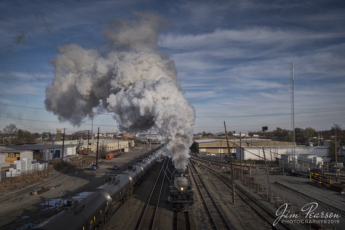 November 13, 2019 - Union Pacific 4014 passes a northbound BNSF tank Train as it heads back through the Locust Street Yard after turning its train on the Van Buren Wye at Little Rock, Arkansas. They turned the train for its display Thursday in Little Rock and Friday morning it will continue its move as it heads for its next overnight stop in Van Buren, Arkansas.

Union Pacific has billed this move as The Great Race Across the Southwest as the train is making a circle around the southwest over a six week or so period hitting Arkansas, Arizona, California, Colorado, Kansas, Missouri, Nevada, New Mexico, Oklahoma, Texas, Utah and Wyoming.
