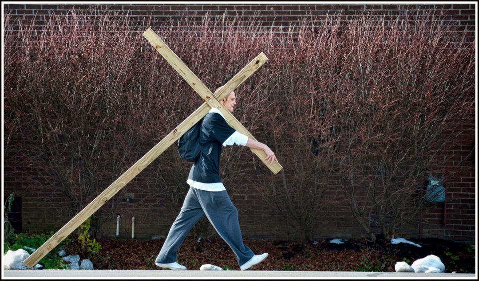 Blast From The Past - January 6, 2013 - Working for 17 years as a photojournalist for The Messenger Newspaper here in Madisonville, Ky had me covering a lot of interesting assignments and Brian T. was one of those folks! 

Brian T. was heading down North Main Street pulling a cross on this Sunday as he headed home from being baptized at Christ View Fellowship Church in Madisonville. Brian didn't want his last name used as he wants all the glory of his actions to go to God. He thinks he's covered about 30 miles so far carrying his cross. - Photo by Jim Pearson, The Messenger Newspaper, Madisonville, Ky