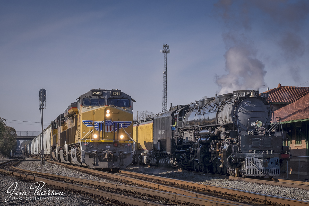 November 13, 2019 - Union Pacific 2581 passes UP Steam Locomotive 4014 Big Boy, as it sits in the siding at Prescott, Arkansas, as it waits for the northbound mixed freight to pass, so the Big Boy can start it's trip north on the Little Rock Subdivision.