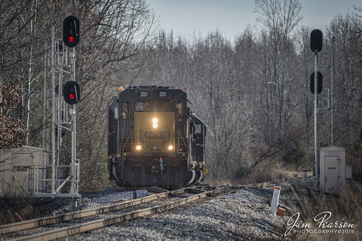 November 27, 2019 - After making a drop-off and pickup at Reed Minerals in Drakesboro, KY via the Paducah and Louisville Railway line to Central City, CSX local J732-27 comes off the East Diamond Lead as it returns to Madisonville, Ky and the Henderson Subdivision with its short train of two cars and 3 units.