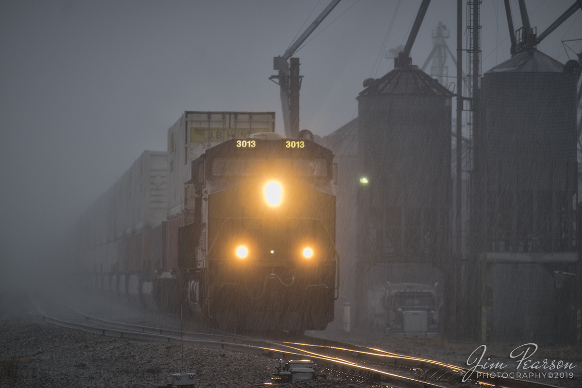 November 20, 2019 - CSX hot intermodal Q028 plows through the driving rain at Trenton, Kentucky as it heads north on the Henderson Subdivision with CSXT 3013 leading the way! Fellow railfan Cooper Smith and I spent time trackside with our golf umbrellas and both came away with some really nice pictures! Getting out trackside in bad weather is a bit tricky, but as you can see the results can be spectacular!