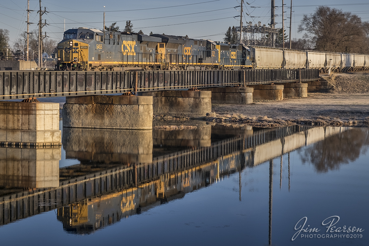 December 7, 2019 - CSXT 5455 leads J783-07 across the Great Miami River at Troy, Ohio as it heads south on the Toledo Subdivision. 

According to Wikipedia: The Toledo Subdivision is a railroad line owned and operated by CSX Transportation in the U.S. state of Ohio. The line runs from Hamilton (north of Cincinnati) north to Perrysburg (near Toledo) along a former Baltimore and Ohio Railroad line.

The south end of the Toledo Subdivision is at the end of the Cincinnati Terminal Subdivision, near the east end of the Indianapolis Subdivision. Its north end is at the end of the Toledo Terminal Subdivision. In between, it junctions with the Middletown Subdivision at New Miami, the Indianapolis Line Subdivision at Sidney, and the Garrett Subdivision at Deshler. 

South of Dayton, the Toledo Subdivision was opened by the Cincinnati, Hamilton and Dayton Railroad in 1851. Later that decade in 1858, the Dayton and Michigan Railroad opened, continuing the line to Toledo. The lines passed to the Baltimore and Ohio Railroad and CSX through leases and mergers.