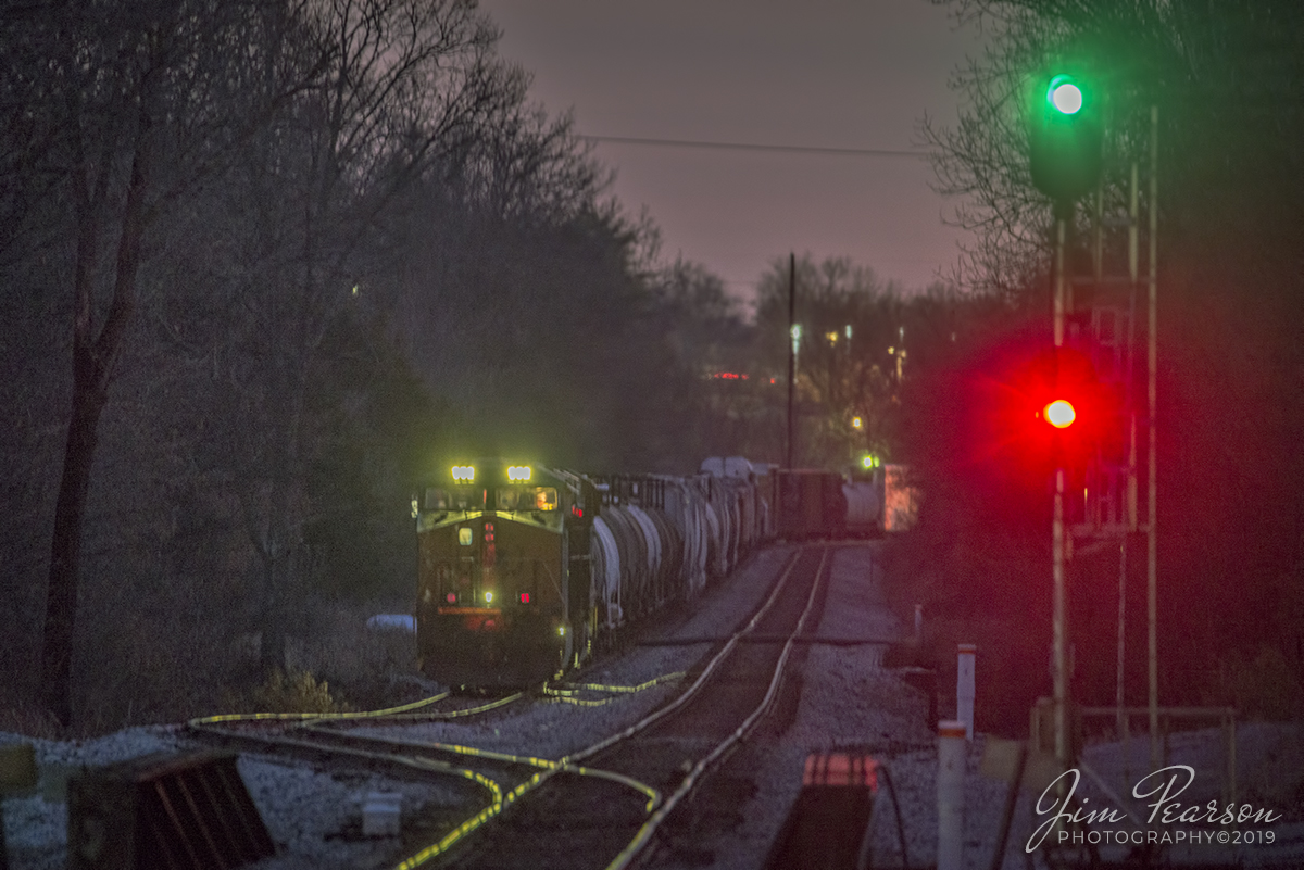 December 12, 2019 - CSX Q500 waits in the dark at the north end of Latham Siding as it waits for it's counterpart, Q501 to pass it, at Hopkinsville, Kentucky on the Henderson Subdivision.