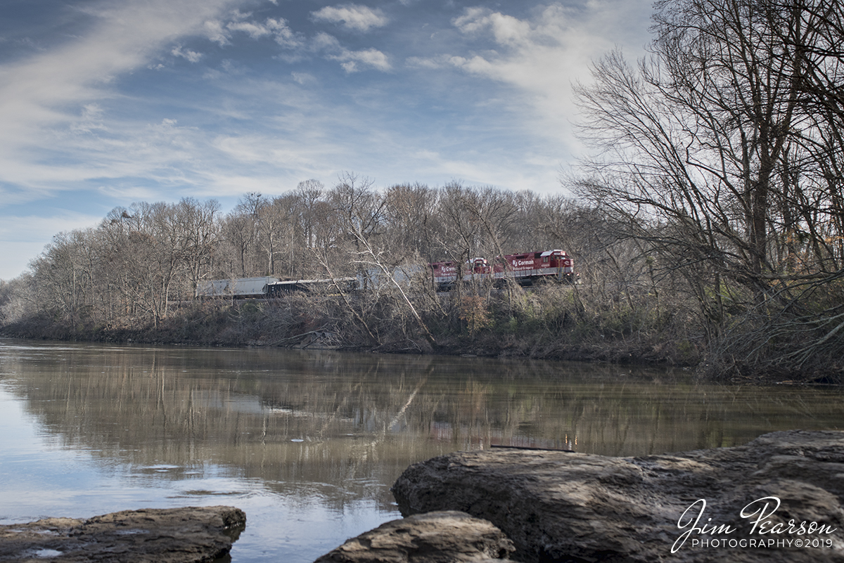 December 20, 2019 - RJ Corman 3837 & 3801 (Cumberland City Turn) meander along the Cumberland River at Palmyra, Tennessee as they head south to Cumberland City on the Memphis Line with the daily local.