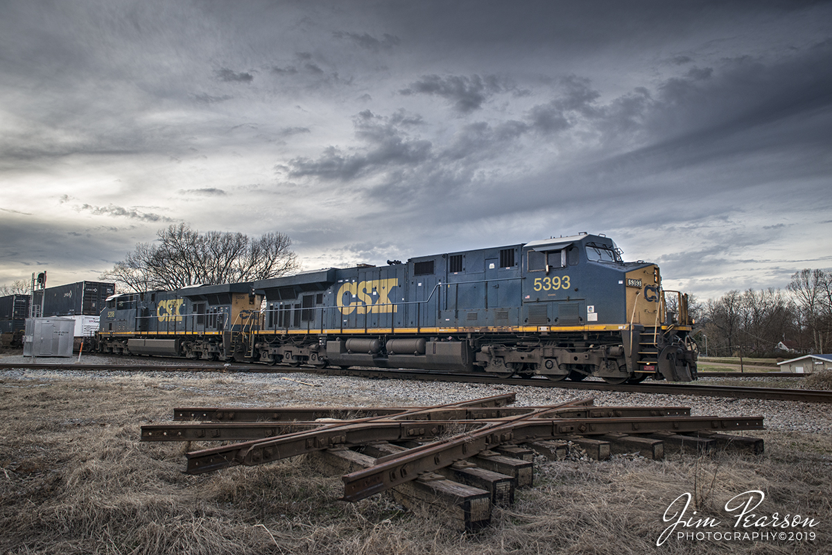 January 1, 2020 - CSX intermodal Q155 crosses over the West Tennessee Railroad at the diamond in Milan, Tennessee as it makes its way north on the CSX Memphis Subdivision with CSXT 5393 & 5208 leading.