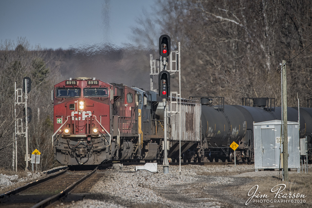January 7, 2020 - CSX K443-06 (Chicago to Lawrenceville, GA), a Canadian Pacific loaded ethanol train, pulls onto the main from the Earlington Cutoff at Mortons Junction, with Canadian Pacific 8915, CP 8824 and CSX 5491 as power, as it heads south on the Henderson Subdivision at Mortons Gap, Ky.