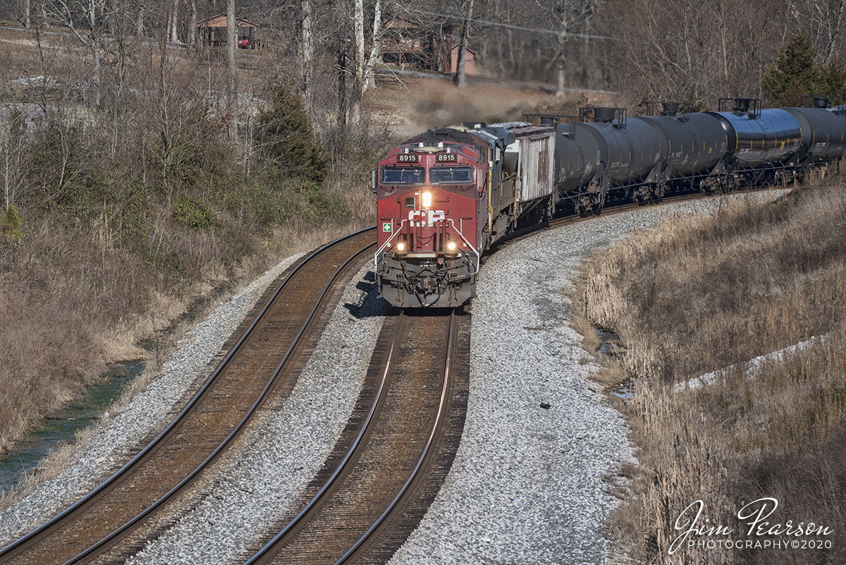 January 7, 2020 - CSX K443-06 (Chicago to Lawrenceville, GA), a Canadian Pacific loaded ethanol train, passes through the S Curve at Nortonville, Kentucky, with Canadian Pacific 8915, CP 8824 and CSX 5491 as power, as it heads south on the Henderson Subdivision.