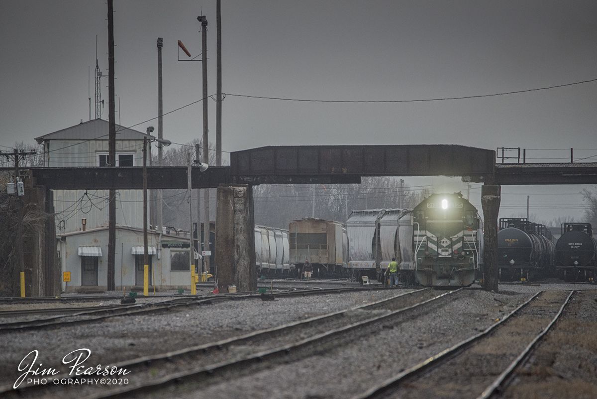 January 15, 2020 - Paducah and Louisville Railway 2121 leads the yard job as it works on moving cars just past the CN crossover in the yard at Paducah, Ky on a foggy morning.