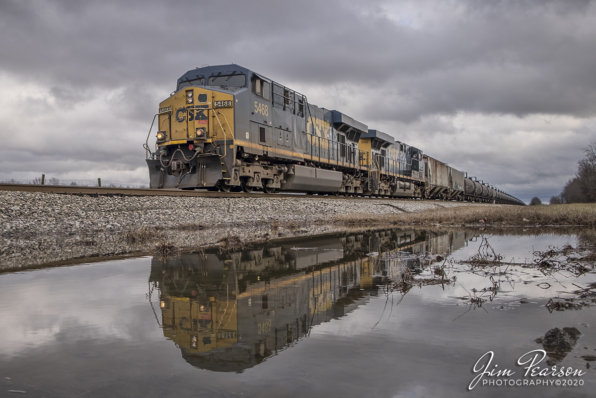 January 18, 2020 - CSX K628 makes for a nice reflection shot as it approaches the defect detector at Ace, just south of Guthrie, Kentucky as it heads north on the Henderson Subdivision with CSXT 6468 leading a empty ethanol train.