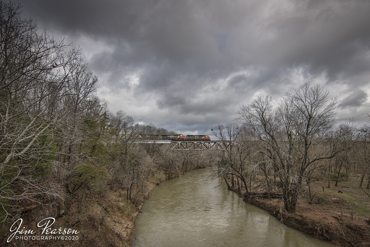 January 18, 2020 - Canadian National Ethanol Train CSX K445 heads over the Red River as it approaches Adams, Tennessee, with CN 5654 leading the way, as it heads south on the Henderson Subdivision.