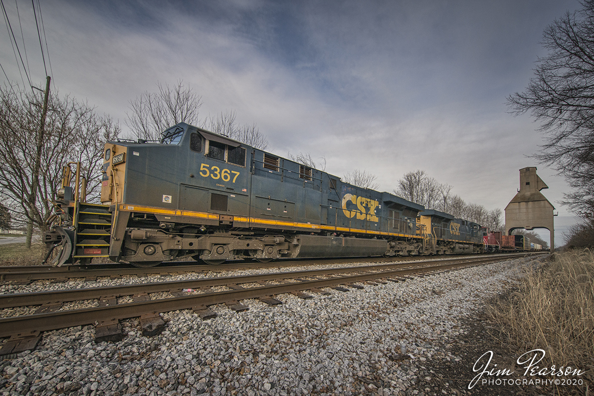 January 23, 2020 - CSX Q501 makes its way south under the old L&N coaling tower at Sullivan, Indiana on the CSX CE&D Subdivision with MVPX 1298, an ex-Canadian Pacific Switcher as the trailing unit.