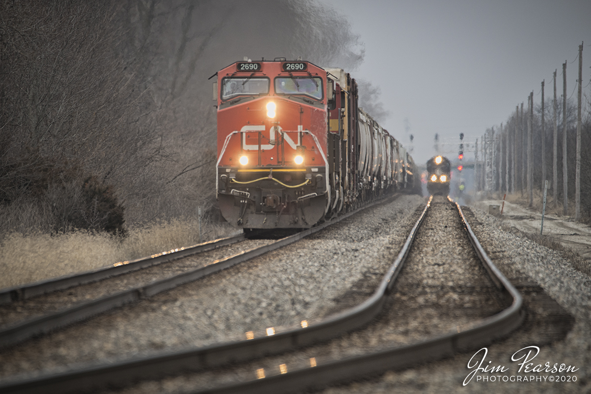 January 30, 2020 - Canadian National (CN) A432, passes CN A408, as it heads south at at Effingham, Illinois on CN's Champaign Subdivision.