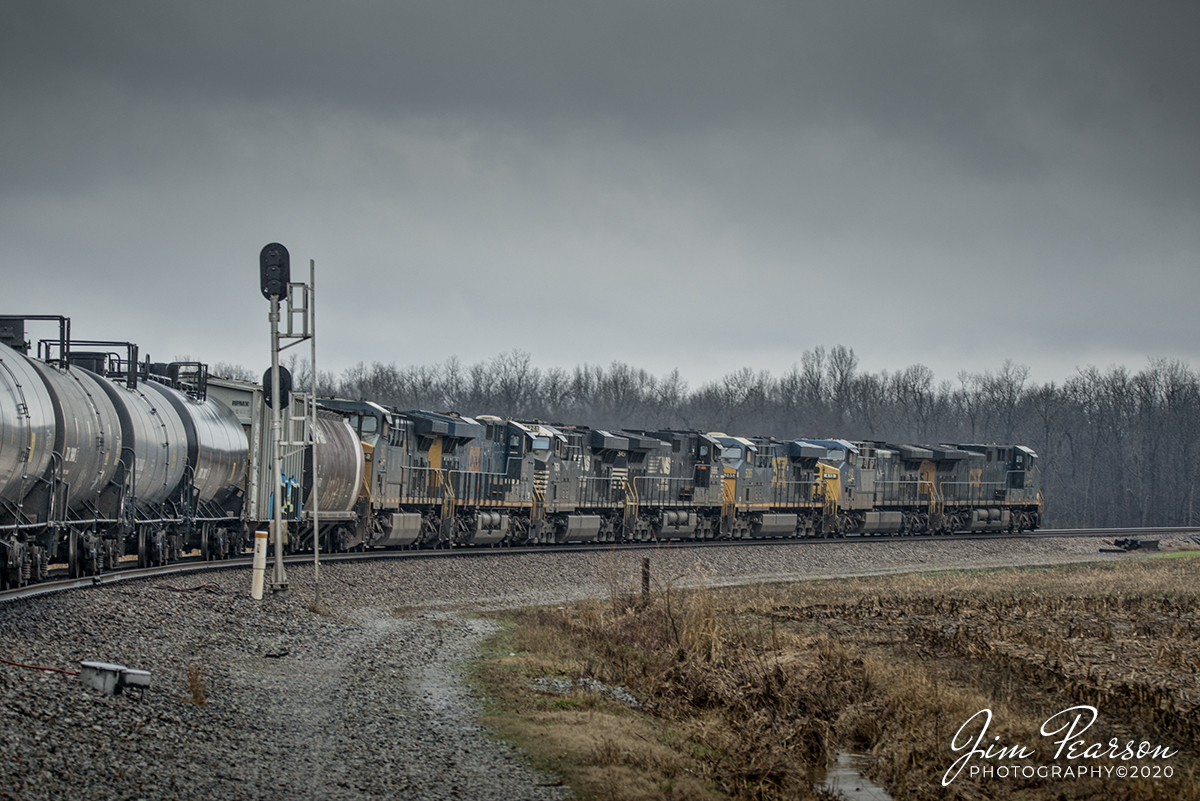 February 5, 2020 - CSXT 429, 413, 5285, NS 9866, 7524, CSX 3198 and 562 lead CSX V112 past the signals at the south end of Breton siding at Breton, Kentucky as it leads a combined empty ethanol and grain train north on the Henderson Subdivision.