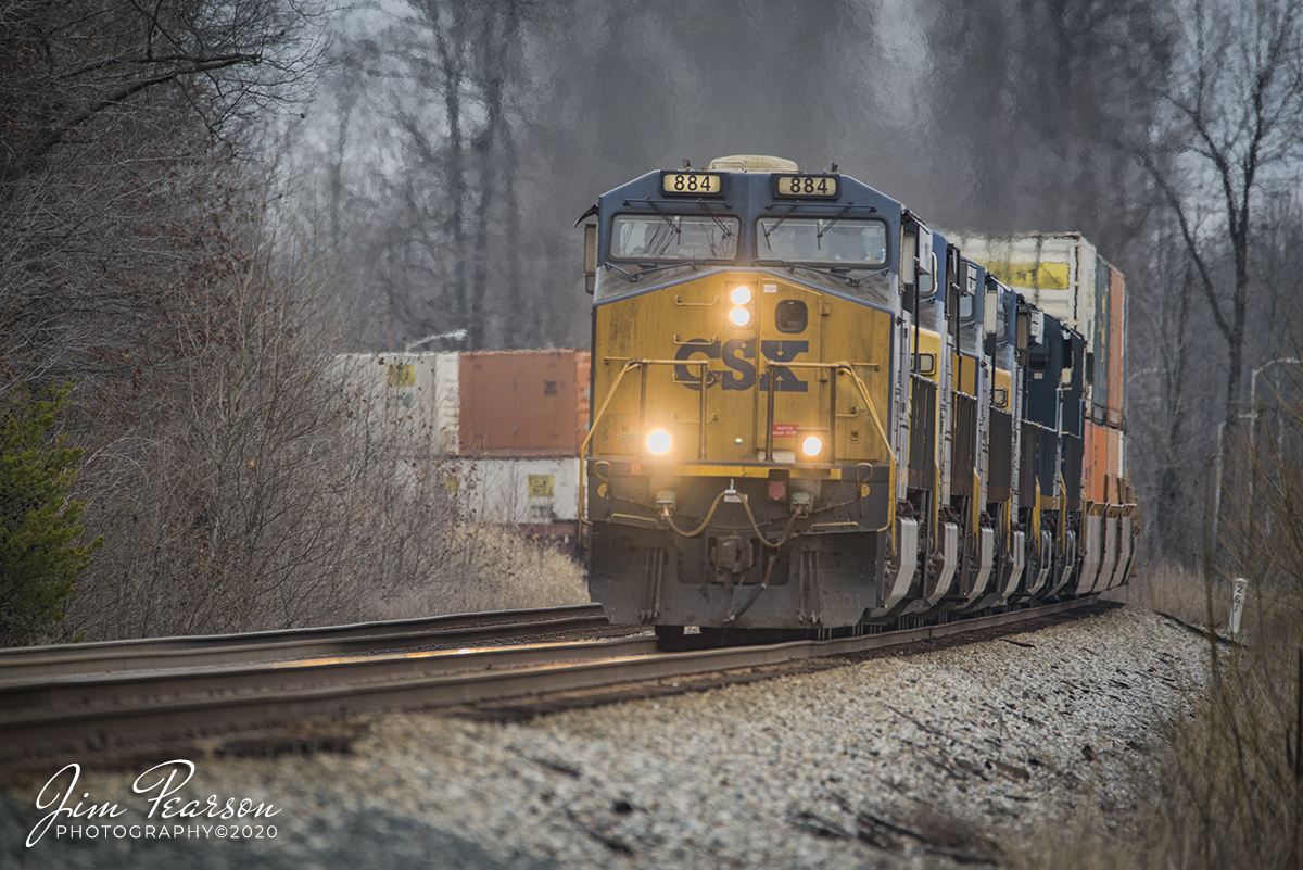 February 17, 2020 - CSXT 884 leads, CSXT 391 (Spirit of Dante), 3030, 124, 829 and one other unidentified unit, lead CSX Q025-17 (Bedford Park, IL - Jacksonville, FL) as it passes the curve leading to the Romney CP at Nortonville, Ky as it heads south on the Henderson Subdivision with its hot intermodal train.