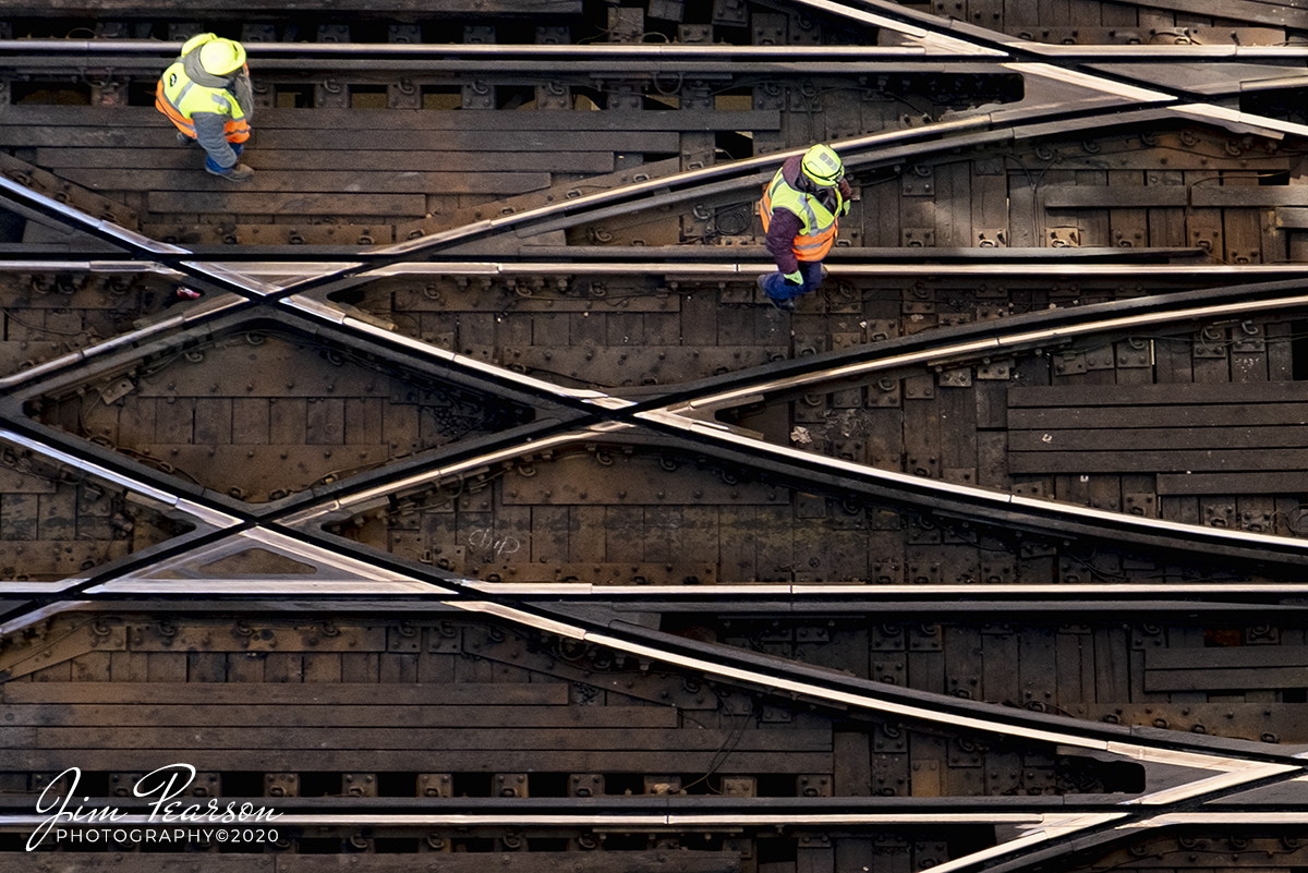 February 20, 2020 - Two CTA Track Inspectors work their way along the maze of tracks at the intersection of the L at Tower 18 in downtown Chicago, Illinois. The safety of rail traffic everywhere falls on the maintenance of way crews as they inspect the miles of tracks in all kinds of weather!