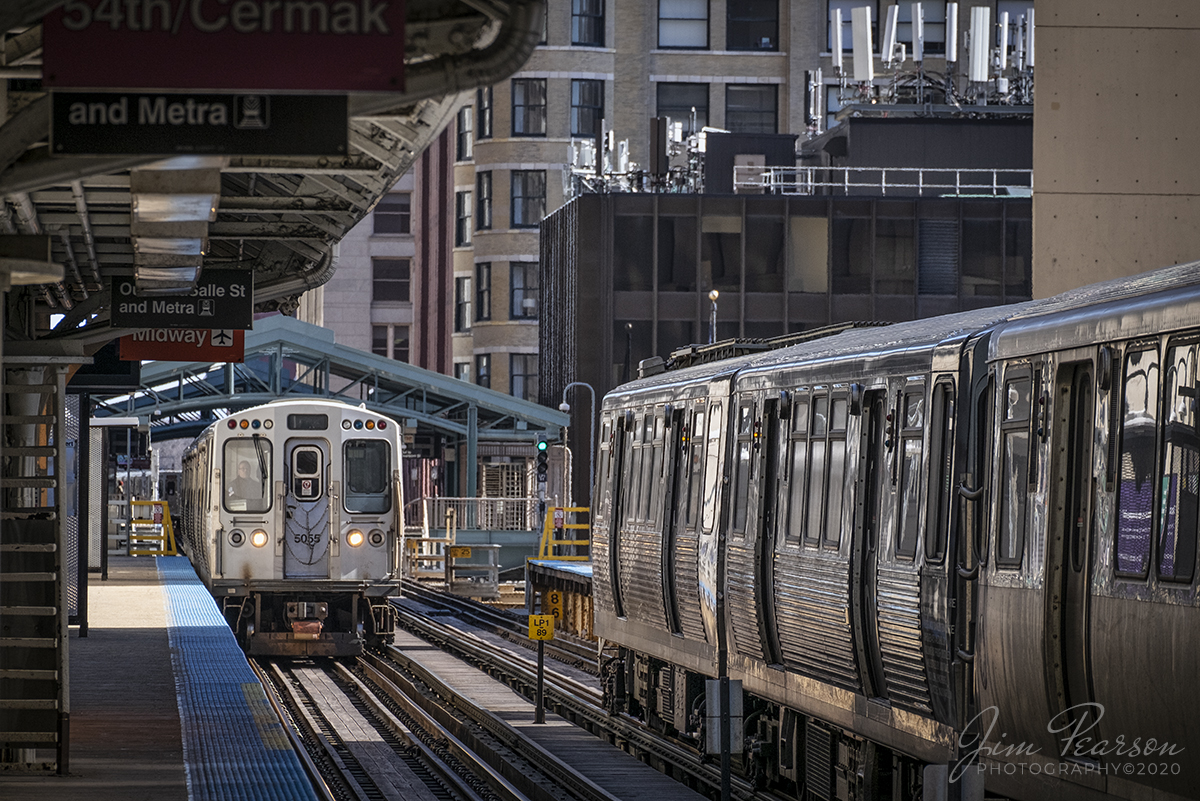 February 20, 2020 - As one leaves a station and the other arrives, two Chicago Transit Authority trains make their way past each other on the downtown Chicago "L" loop in Chicago, Illinois.