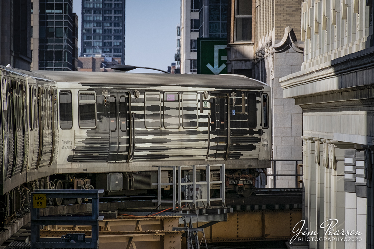 February 20, 2020 - The head car on a Pink Line set  "Floating Museum" #5052, makes its way through the downtown loop on the "L" in downtown Chicago, Illinois. 

According to the Floating Museum Website: The Floating Museum partnered with the Chicago Transit Authority and Chicago Park District to transform the Green Line into a moving cultural destination, activating several parks along the south and west ends of the line between July 2019 - September 2019. 

Cultural Transit Assembly serves both to celebrate the cultural work being done in these neighborhoods as well as to strengthen the ties between these spaces. This project is also an opportunity for Floating Museum to continue to foster collaborations between local, municipal, and community based organizations with larger city institutions.

Floating Museum developed site-specific exhibitions that highlighted local histories with complimentary public programs including live musical performances, panel discussions, neighborhood walking tours, film screenings, and more.

Cultural Transit Assembly happened up and down the CTA Green Line and included Founders which is a mobile monument and collaboration between Floating Museum, Chris Pappan and Monica Rickert-Bolter.

For more information visit: https://floatingmuseum.org/Transit