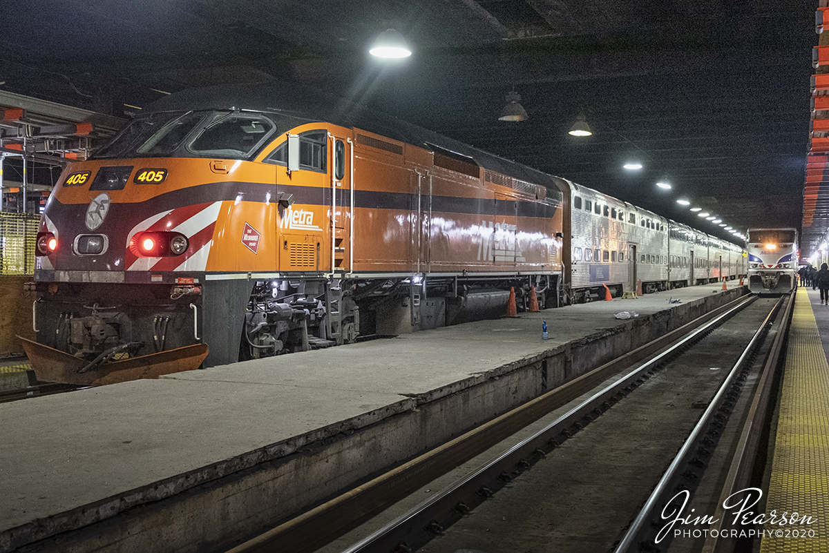 February 20, 2020 - Metra's Milwaukee Road heritage Unit 405 waits to depart from Union Station in downtown Chicago, Illinois. 

According to a Metra January 25, 2019 press release: The Milwaukee Road locomotive is the second locomotive to be painted in heritage colors after an earlier one painted in a color scheme of the old Rock Island Line. The locomotives have been recently rebuilt and getting a new coat of paint  either in the regular Metra scheme or in heritage colors.