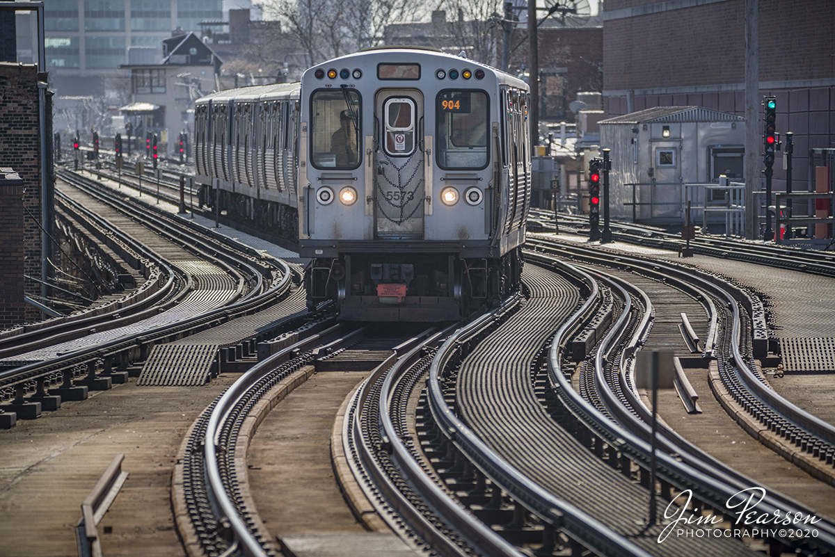 February 21, 2020 - Chicago Transit Authority train 904 approaches the Howard Street Station in Chicago, Illinois on a sunny cold day.
