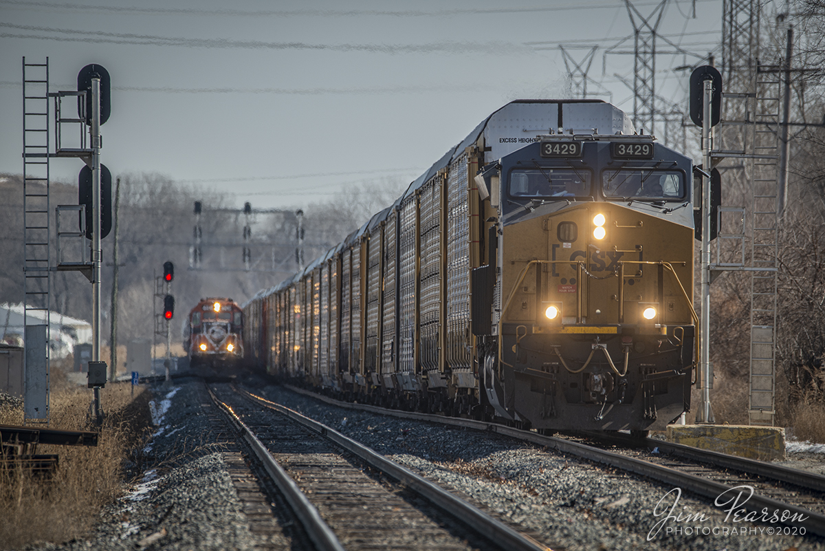 February 22, 2020 - Indiana Harbor Belt 4015 and 4017 run alongside CSXT 3429 at Dolton, Illinois on track two as they head west on the Indiana Harbor Belt line headed back toward their Blue Island yard as the CSX autorack continued its move.