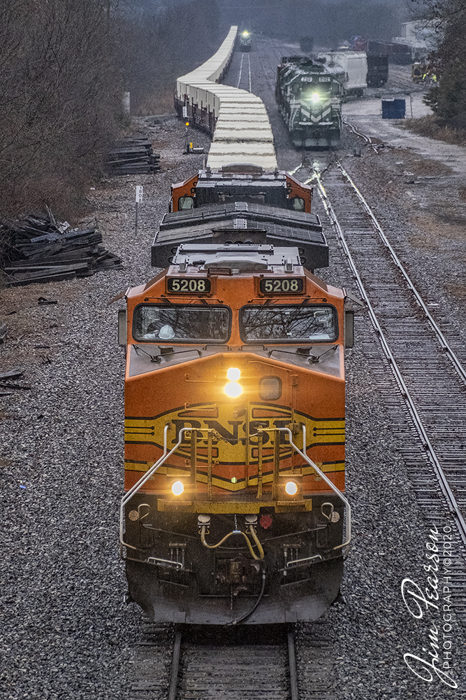 February 24, 2020 - Northbound BNSF 5208 pulls out onto the Paducah and Louisville Railway (PAL) main after a three way meet between a southbound loaded coal, the afternoon local and its load of military containers at the PAL Yard in Princeton, Kentucky.