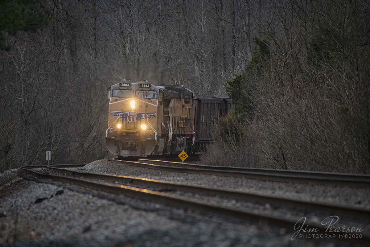 February 26, 2020 - Union Pacific 5883 rounds the curve coming into Hanson, Ky as it heads south on the Henderson Subdivision with a empty coke train.