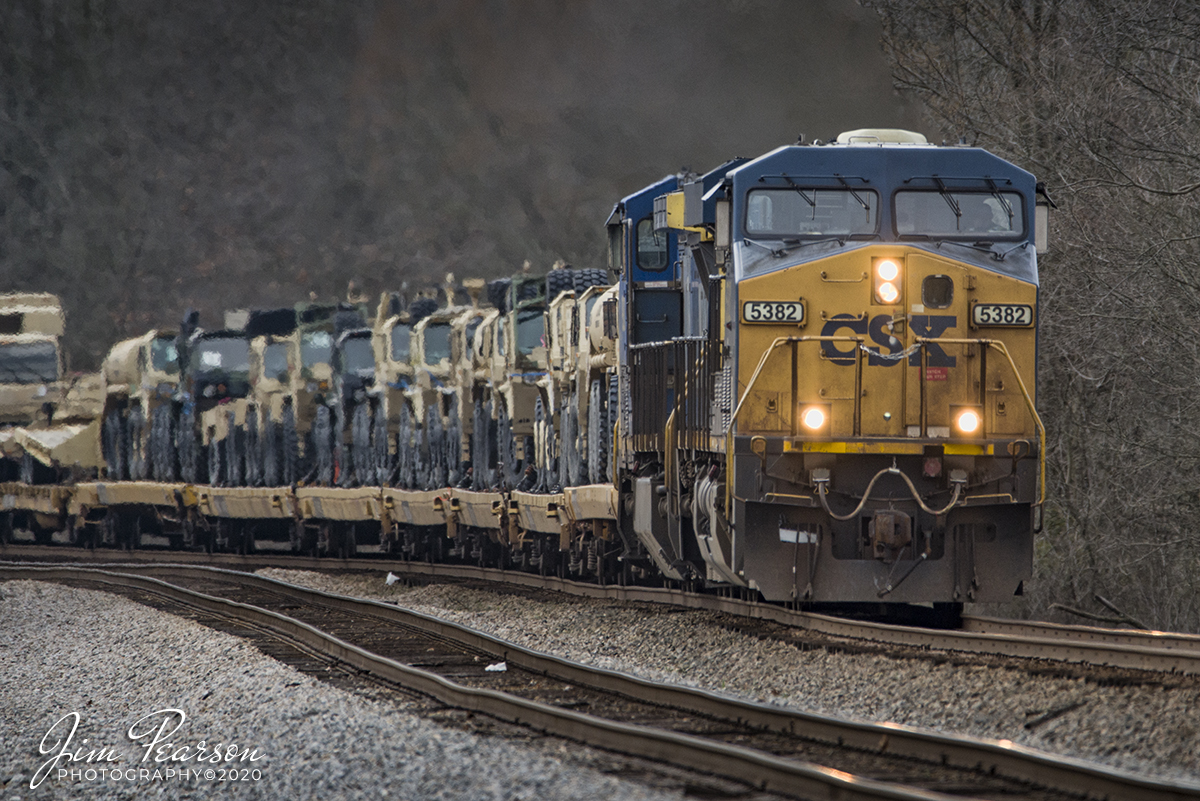 March 6, 2020 - CSX W840-03 is led by CSXT 5382 as it heads north on Henderson Subdivision at the north end of Slaughters, Kentucky with a loaded military train.